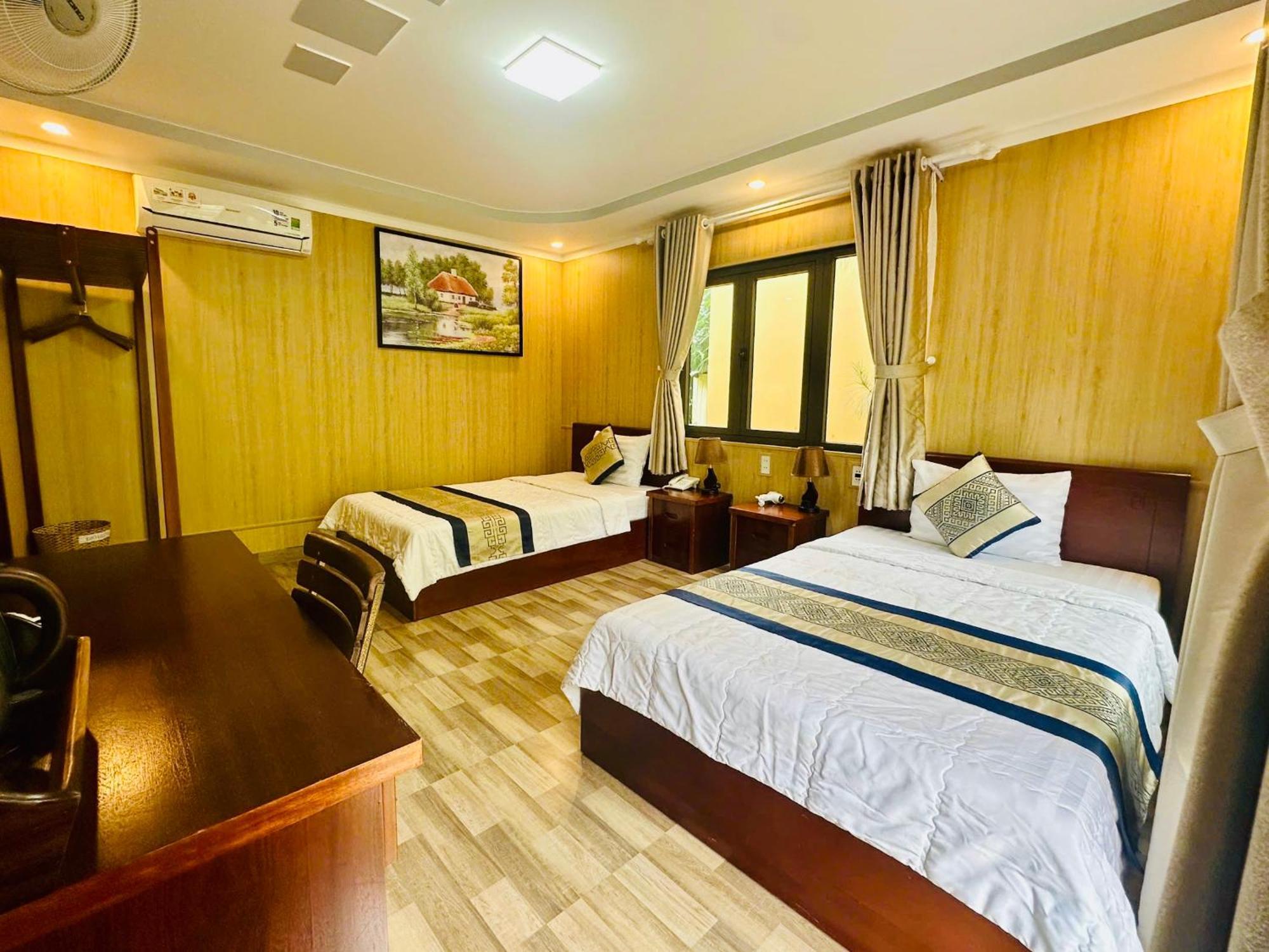 Bazan Home - Hotel & Bungalow Pleiku Habitación foto